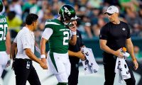 Jets beat Eagles, Zach Wilson exits with knee injury